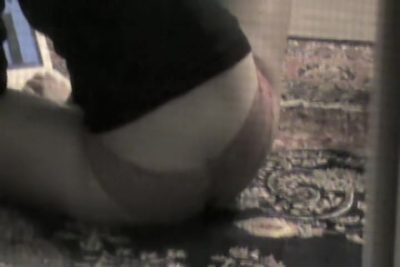 Girl is naked exposing hot firm boobs on window cam