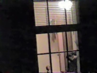 Naked bimbo is dancing and getting spied thru window