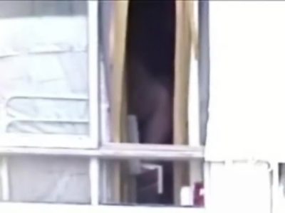 Naked chick is hiding behind curtains from my cam