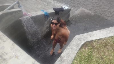 A Curvy Girl Gets Completely Changed And Takes Naked A Shower Outdoors On The Beach